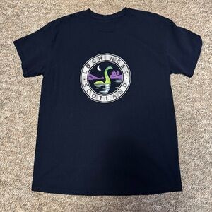 Loch Ness Scotland Graphic Tee - Navy Blue with Green & Purple Logo
